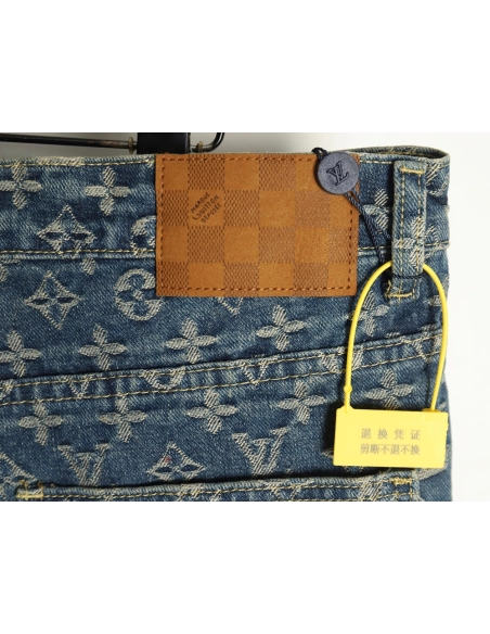 Louis Vuitton washed blue jeans with all-over print and side straps,Louis Vuitton