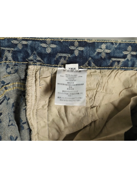 Louis Vuitton washed blue jeans with all-over print and side straps,Louis Vuitton